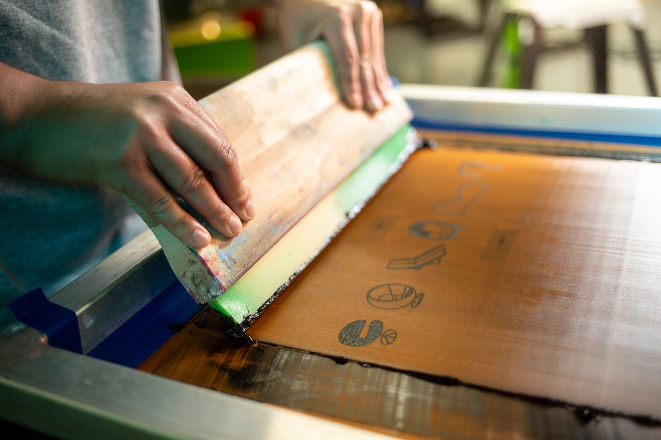 Screen printing business owner working in a shop